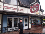 Motorcyclist in Solvang in front of bakery